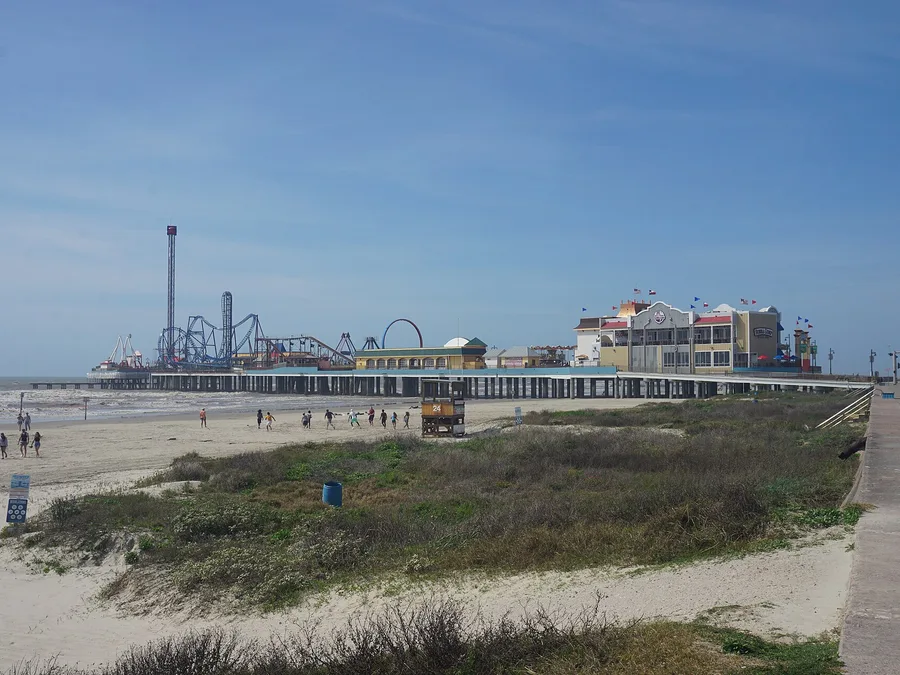 The Galveston Island Historic Pleasure Pier over the beach